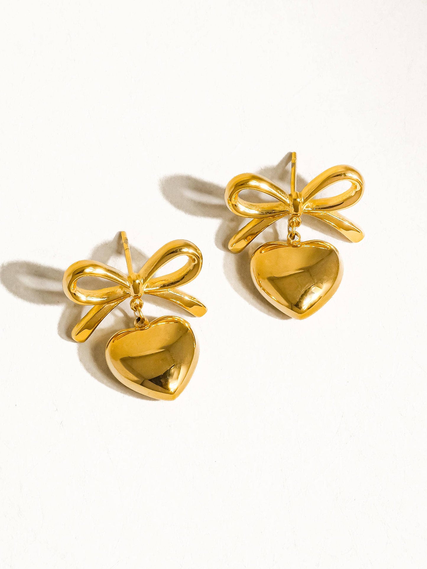 Melody Bow Heart Studs
