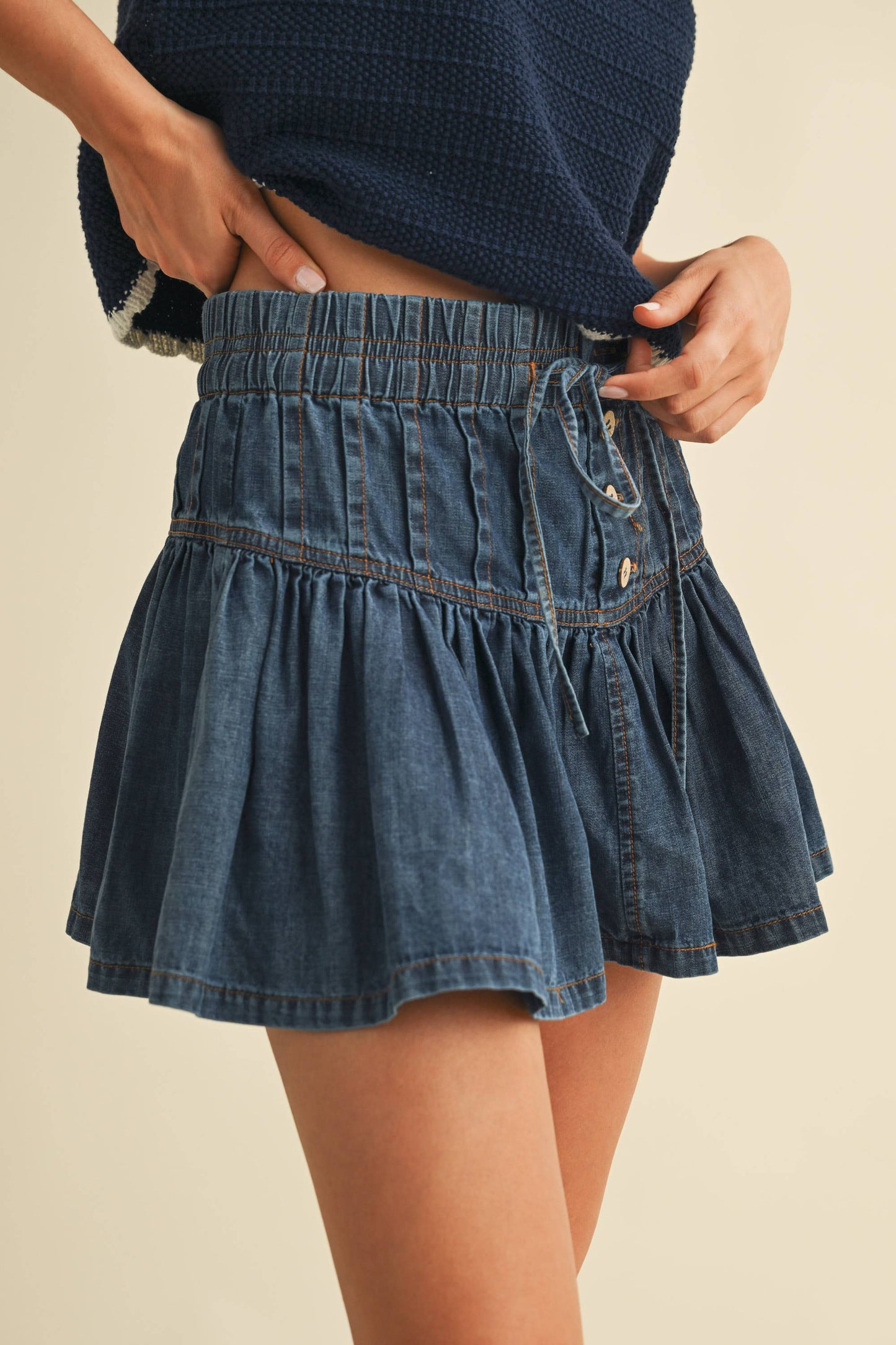 DENIM FLARED RUFFLE MINI SKIRT