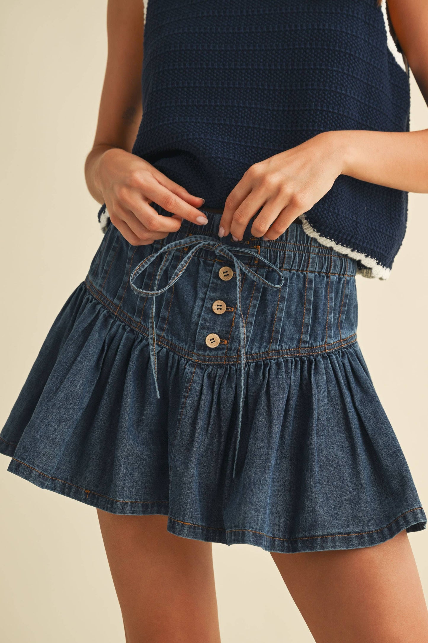 DENIM FLARED RUFFLE MINI SKIRT