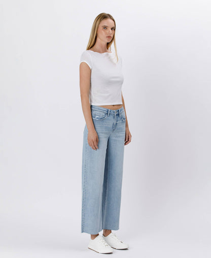 HIGH RISE LIGHT WASH RAW HEM WIDE LEG
